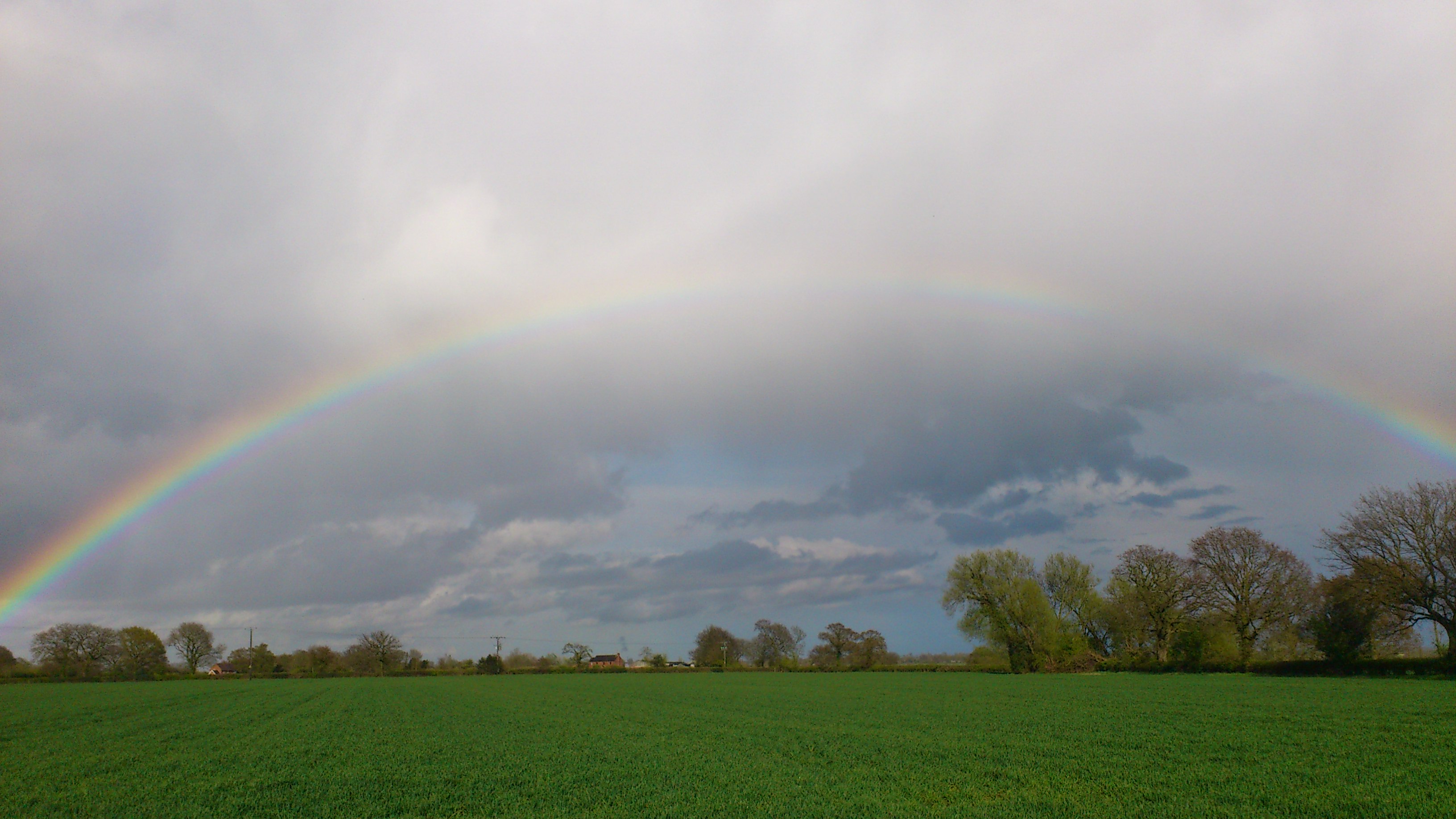 Rainbow over fields.